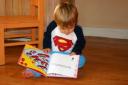 Child reading a book